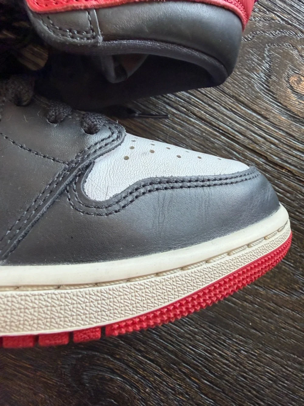 Air Jordan 1 Retro OG High Black Toe Reimagined men’s size 9